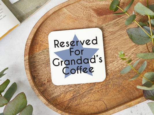 Personalised coaster for Grandad. White coaster with a blue star and the text reserved for grandads coffee.