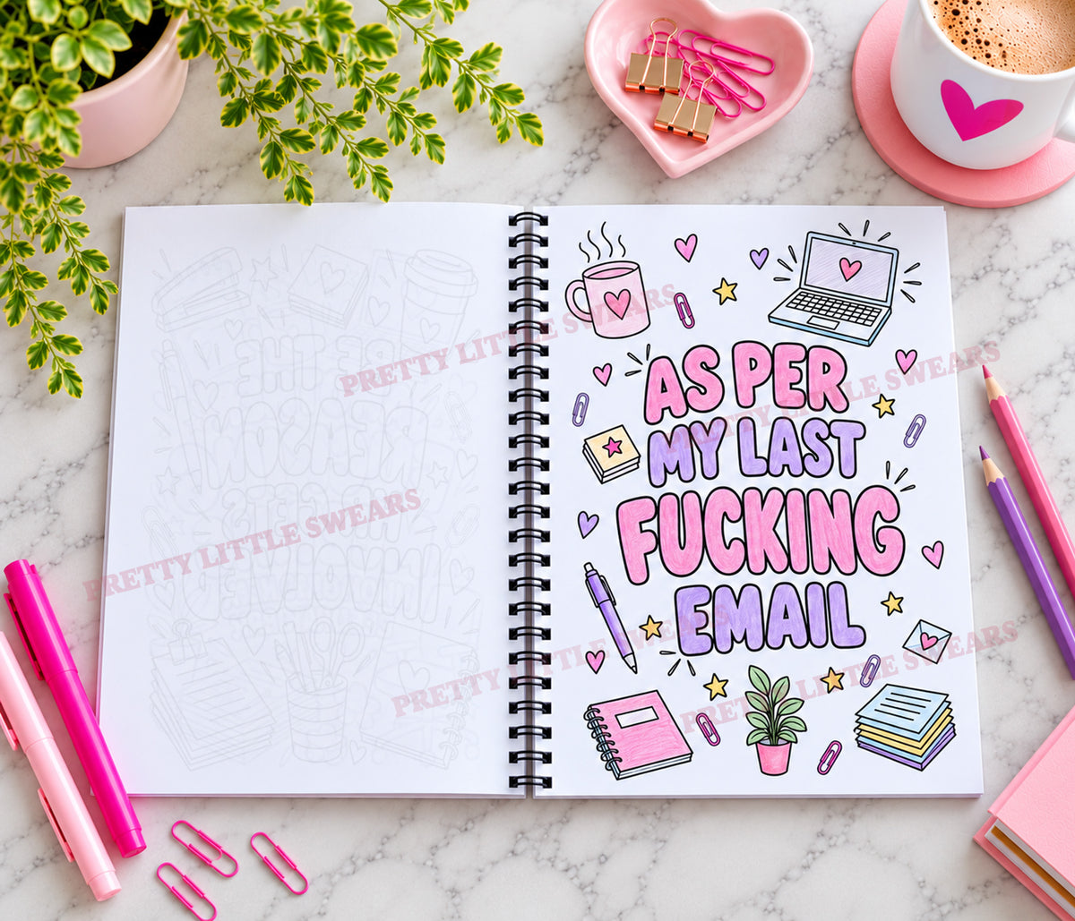 A spiral-bound  sweary work notebook open on a marble surface, featuring a pink and purple hand-drawn graphic that reads 'AS PER MY LAST FUCKING EMAIL' surrounded by cute doodles like a laptop, coffee mug, stars, and notebooks. The notebook is styled with pink pens, paperclips, a heart-shaped pink cup, and green plants.